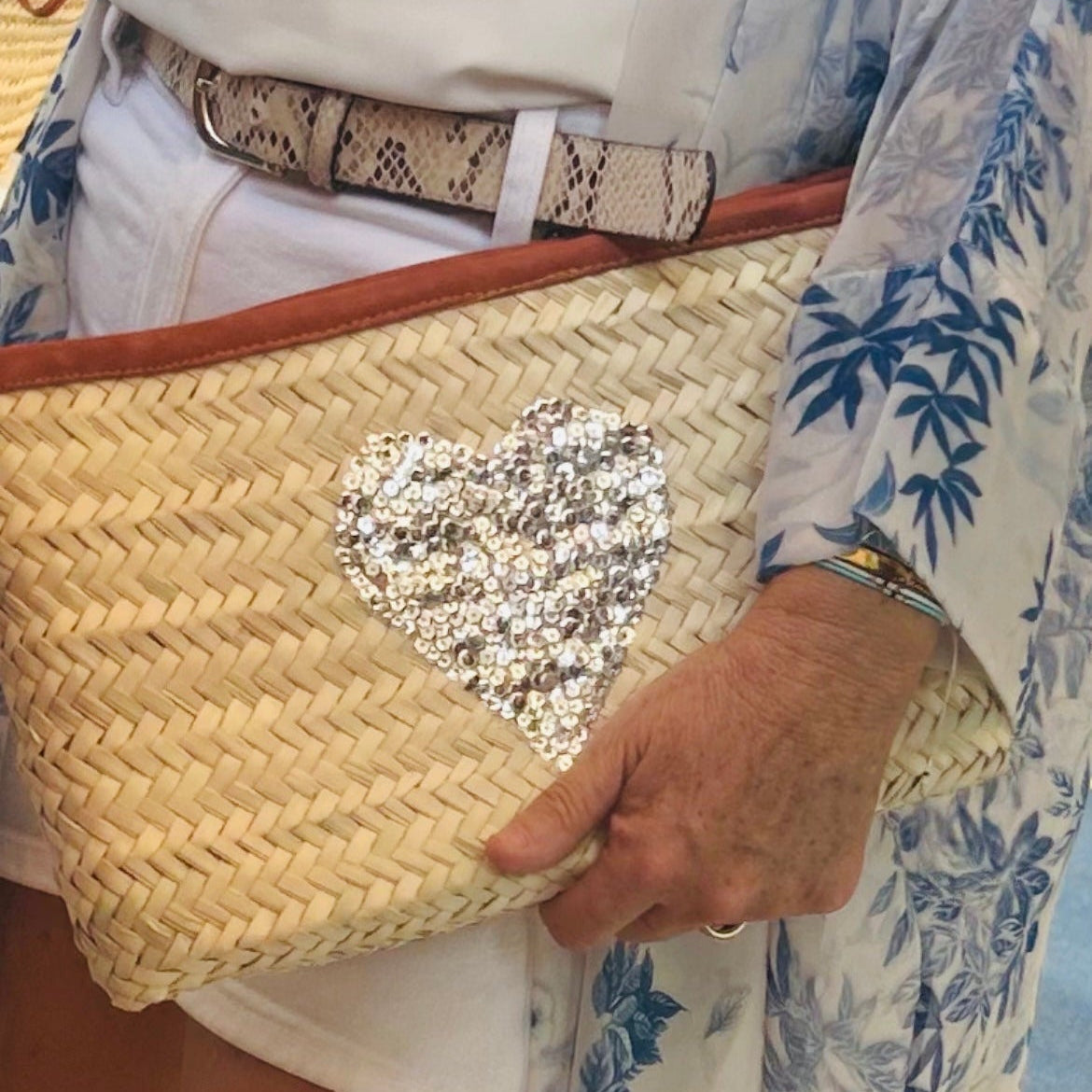 Woven Moroccan clutch bag with leather trim and sequin silver heart.