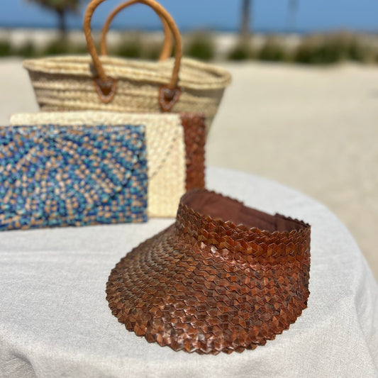 Deep tan woven sun visor with elasticated panel at the back for comfort and fit