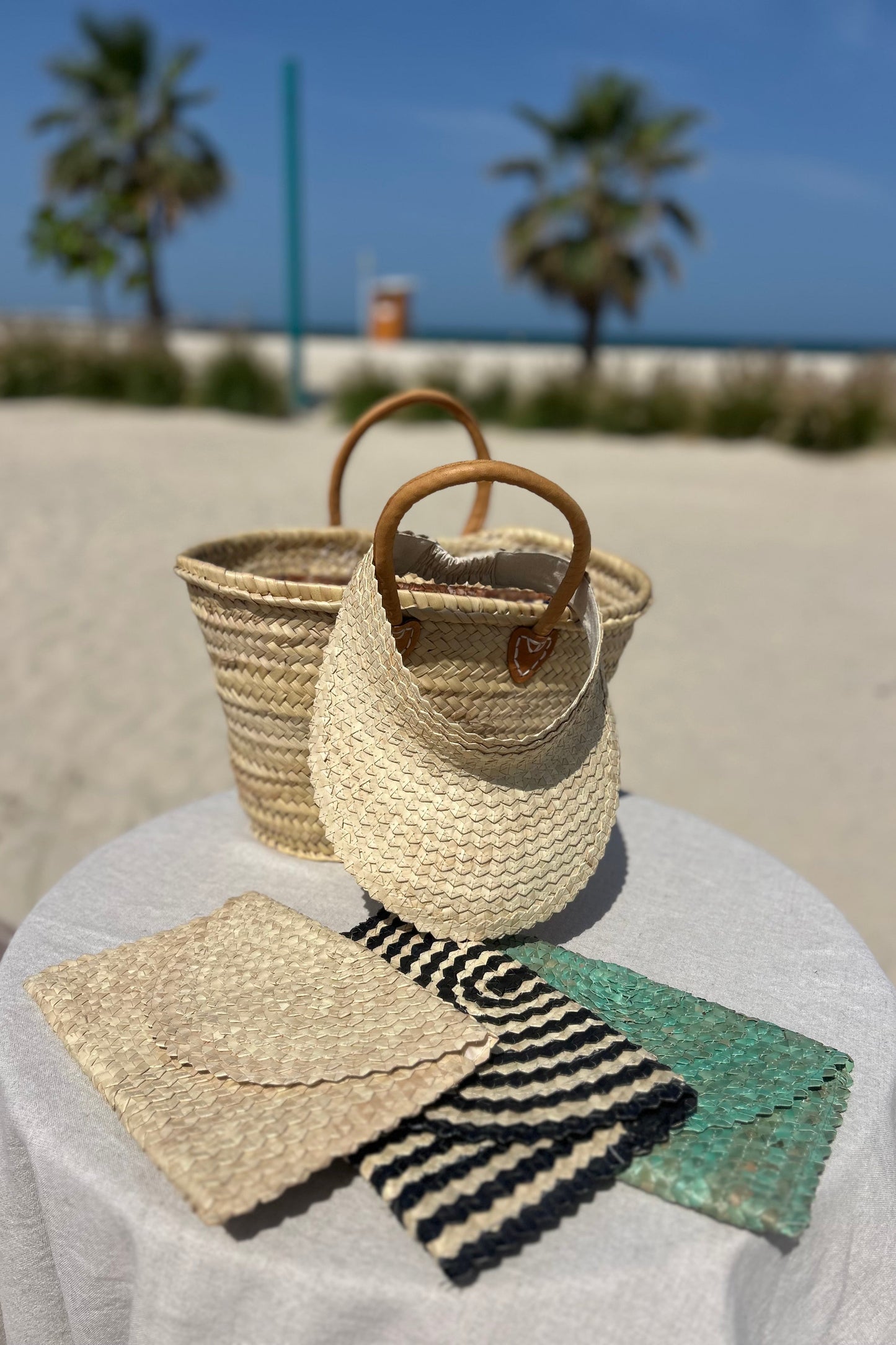 Palm woven envelope clutch bag