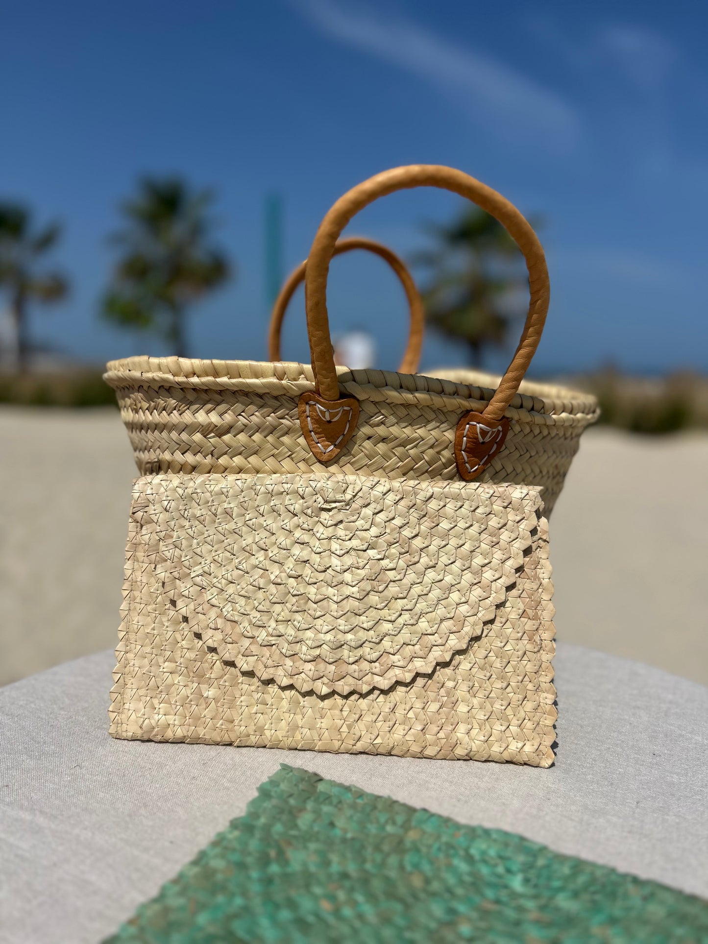 Palm woven envelope clutch bag