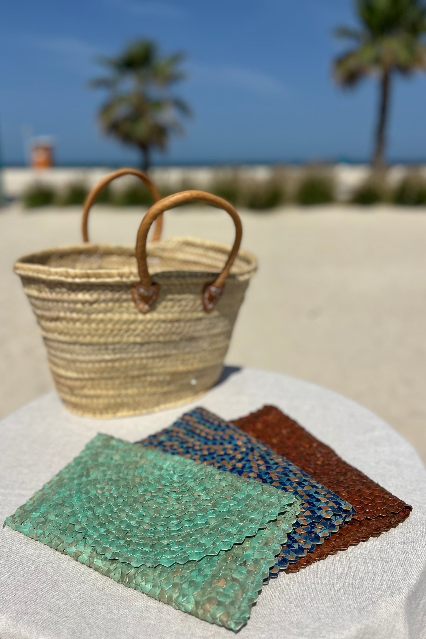 Palm woven envelope clutch bag