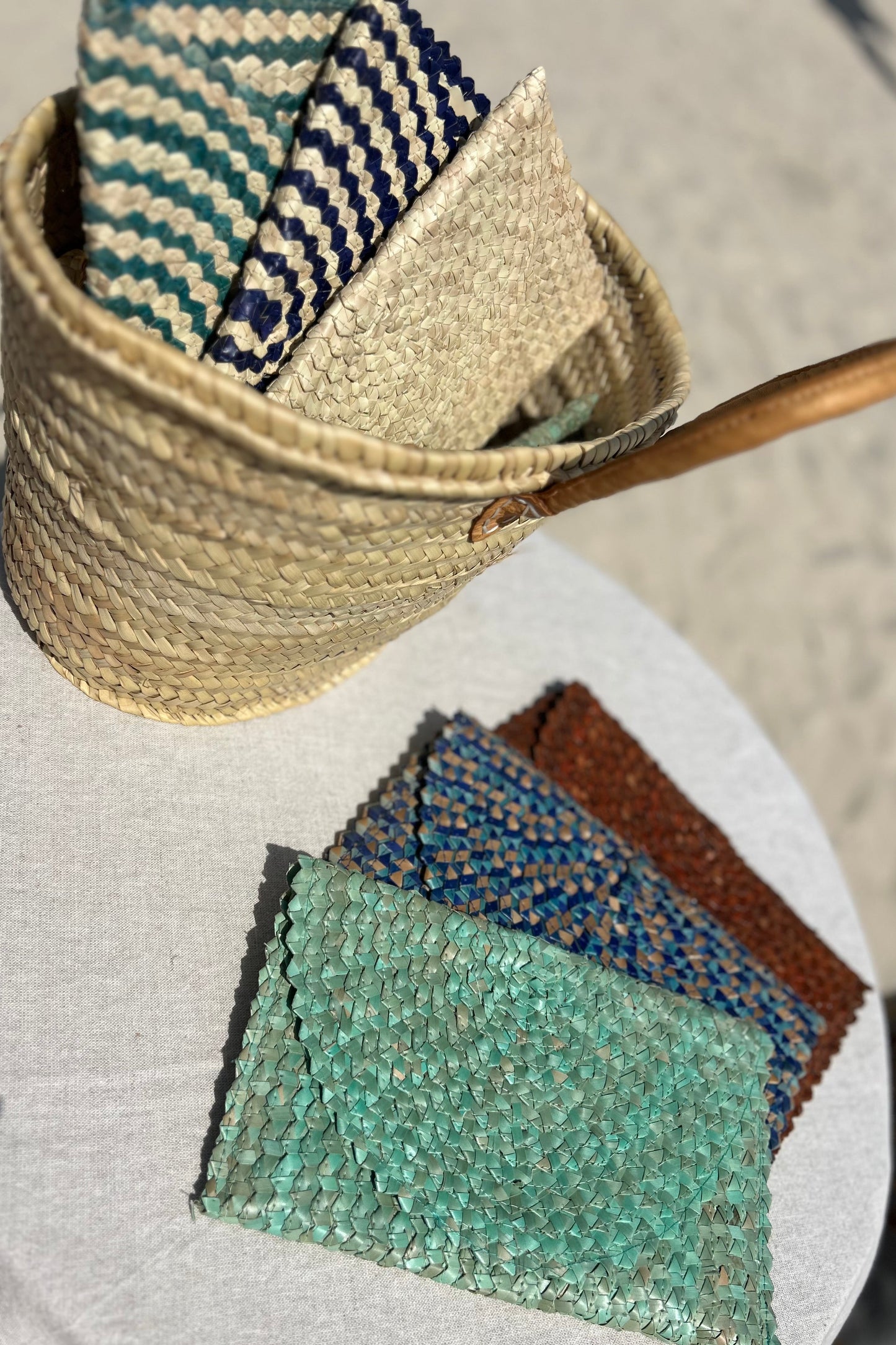 Palm woven envelope clutch bag