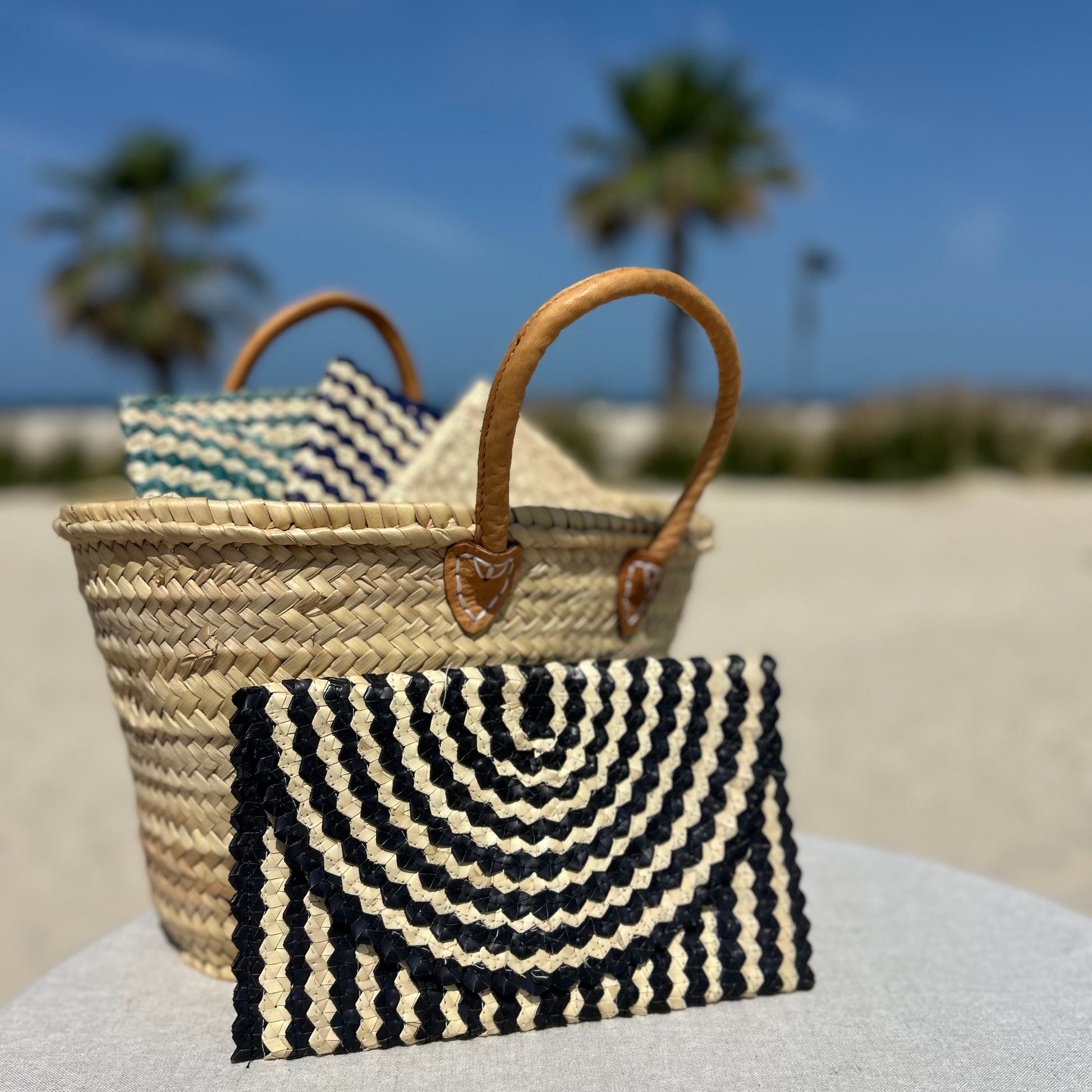 Black and cream striped Woven clutch bag