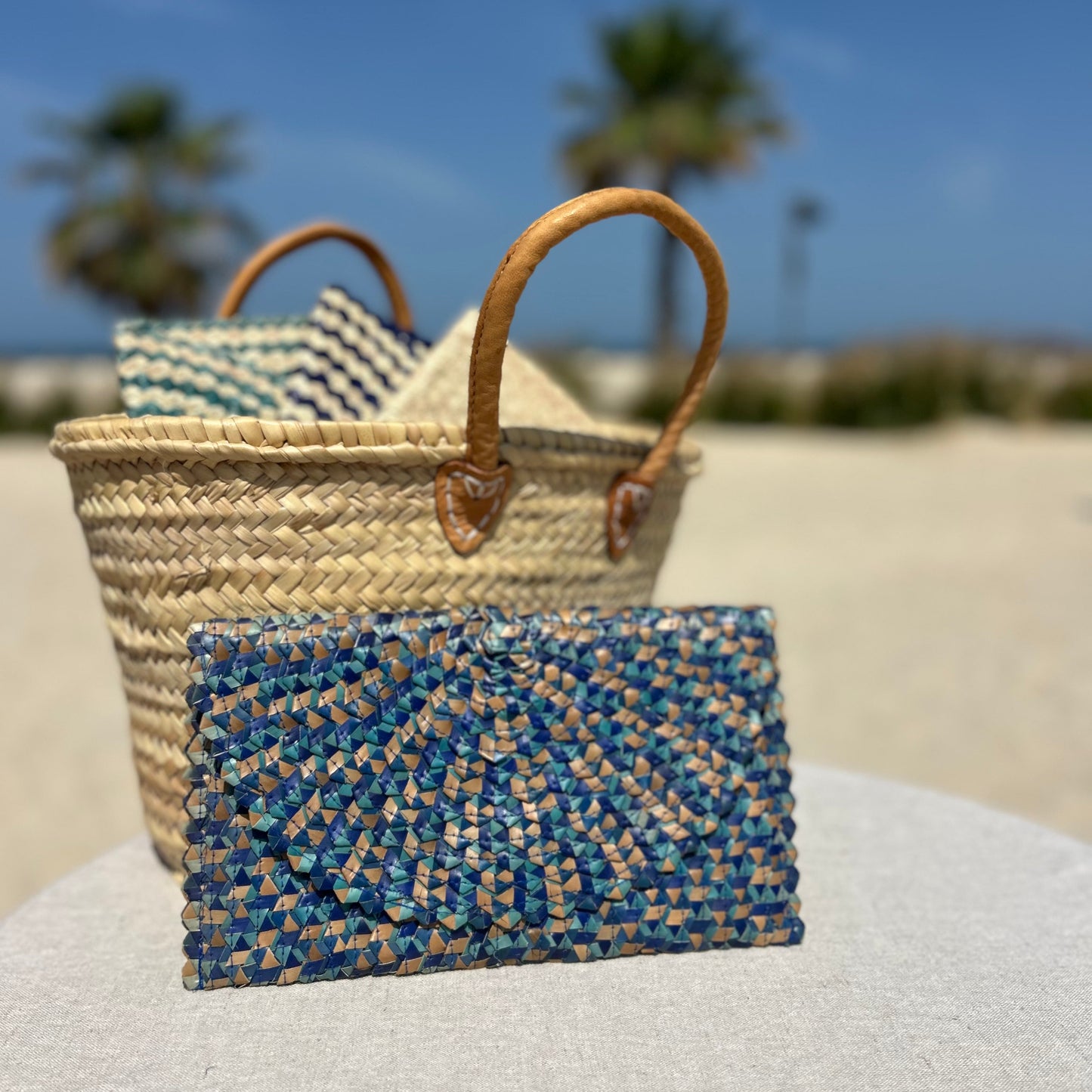 Palm woven envelope clutch bag