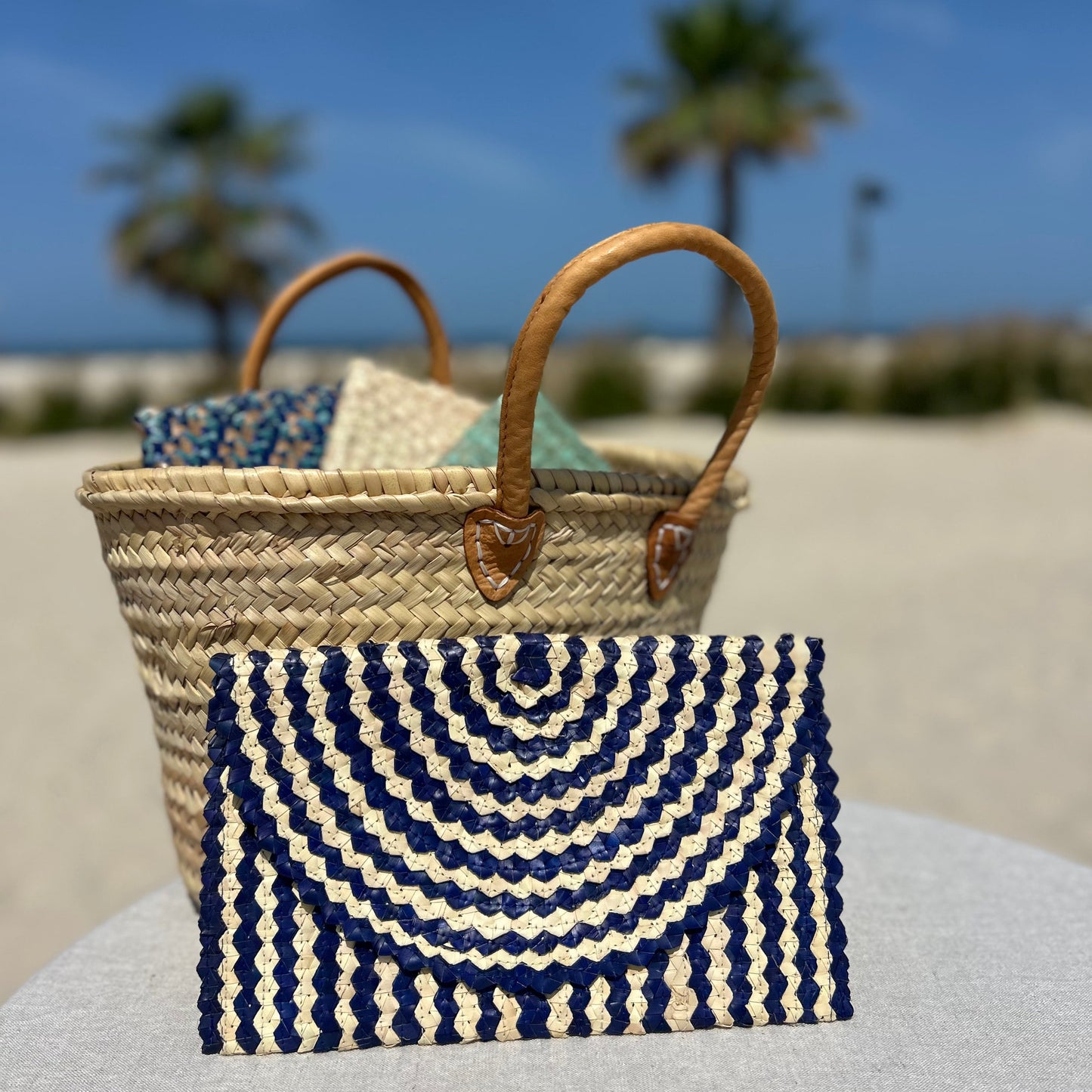 Palm woven envelope clutch bag