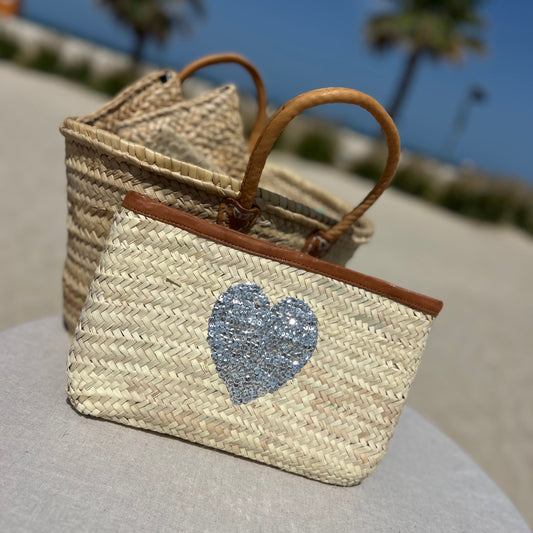 Natural palm Moroccan woven clutch bag with sequin silver heart and leather trim and zip fastener