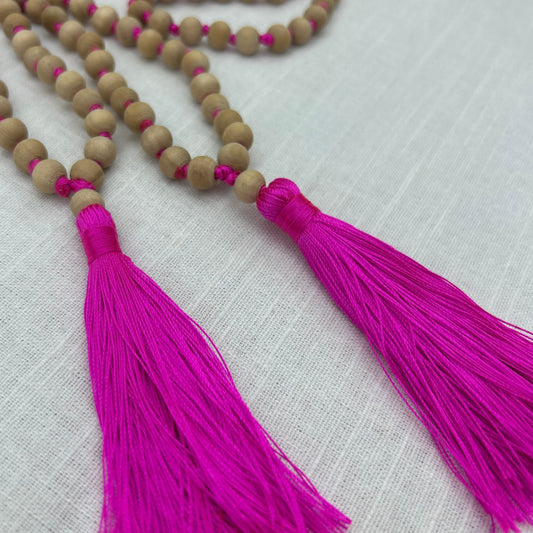 Wooden Beaded necklace with pink tassels 