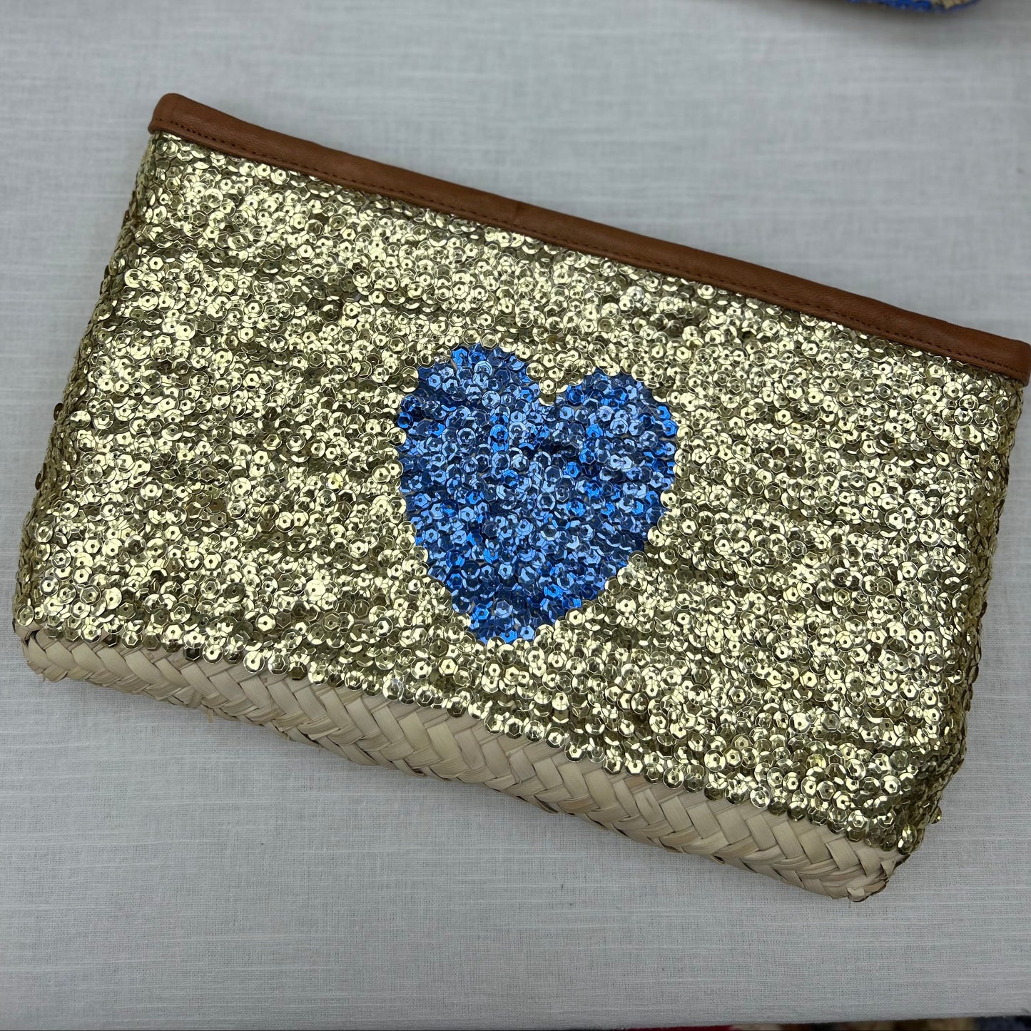 Hand made Morroccan Gold sequin clutch bag with a blue heart 