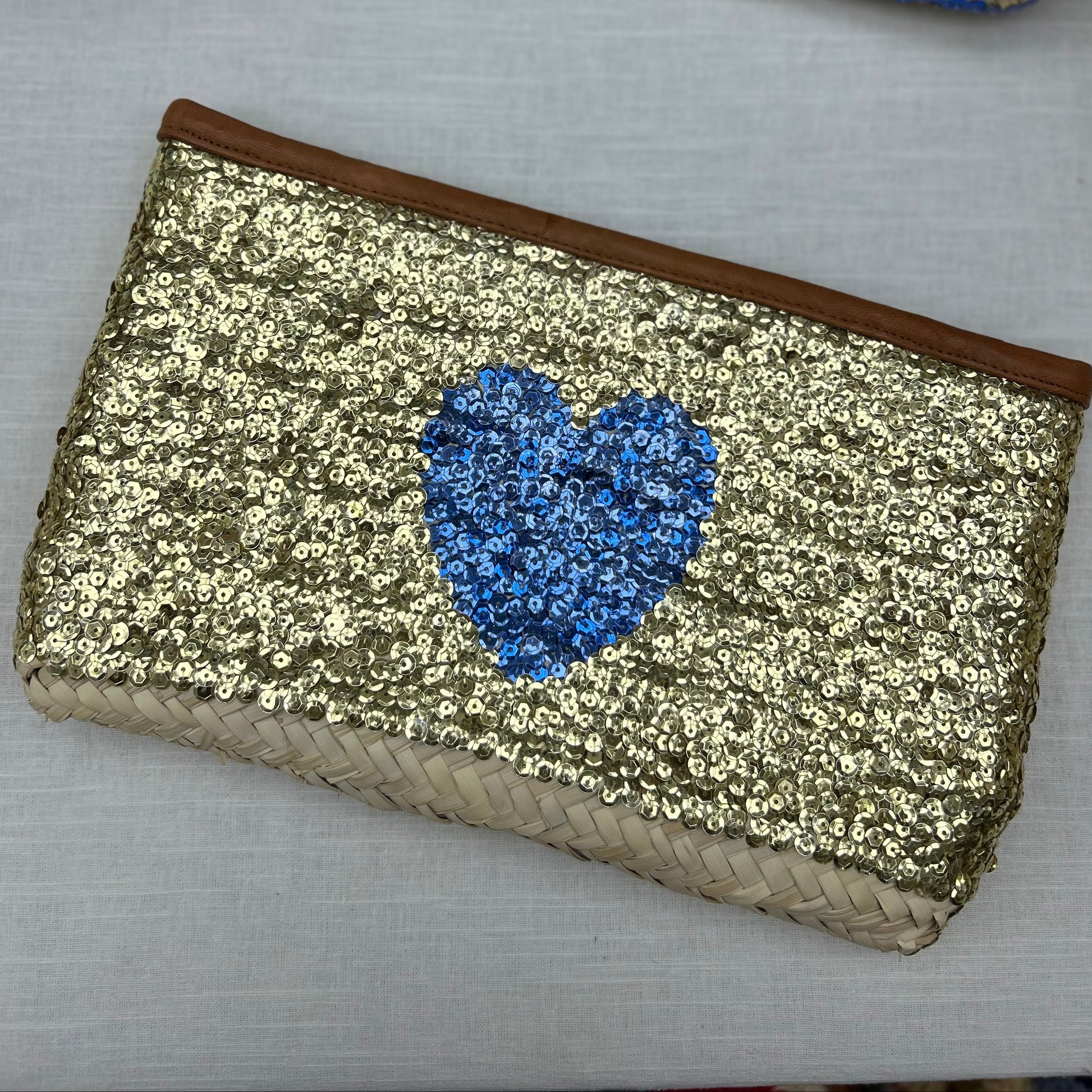 Hand made Morroccan Gold sequin clutch bag with a blue heart 
